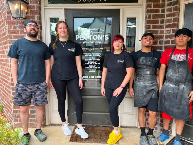 The staff of Peyton's Pizzeria in Flowery Branch