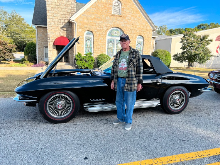 Second-generation Corvette in Black with side pipes