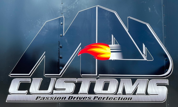 MAD Customs logo on a trailer
