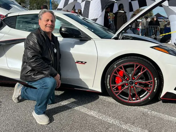Close up of an Arctic White 2023 Corvette coupe