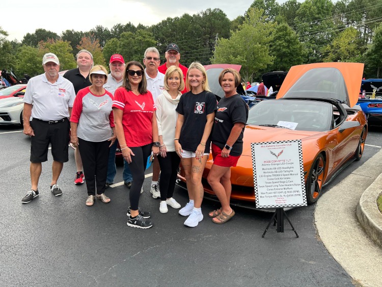 Members of the Mid Alabama Corvette club at a car show.