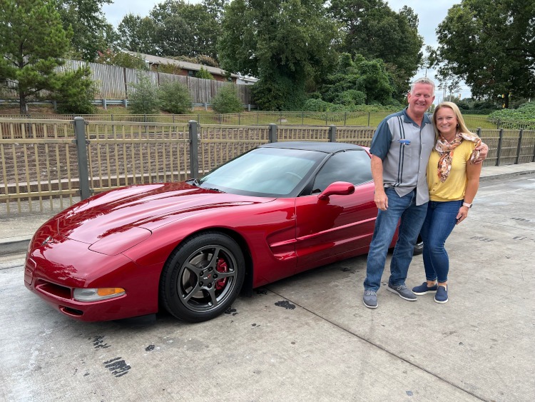 Fifth-generation Corvette coupe in deep red.
