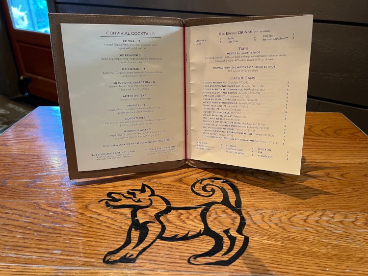 An open menu on a table top.