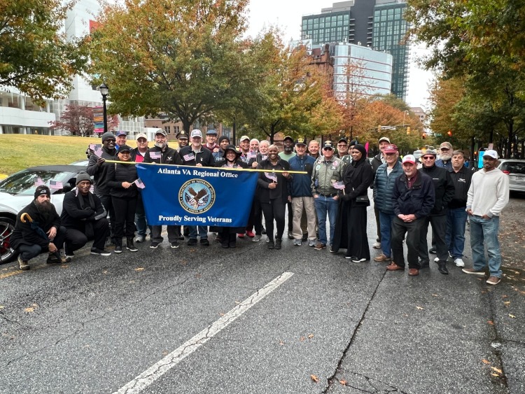A group of people attending the annual Veterans Day parade in Atlanta.