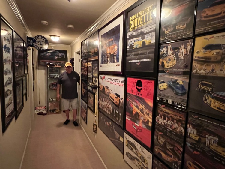 A hallway of a Corvette man cave.