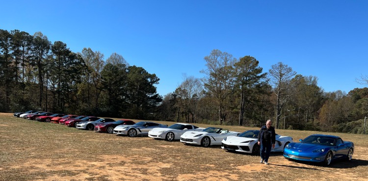 Corvettes lined up in a field
