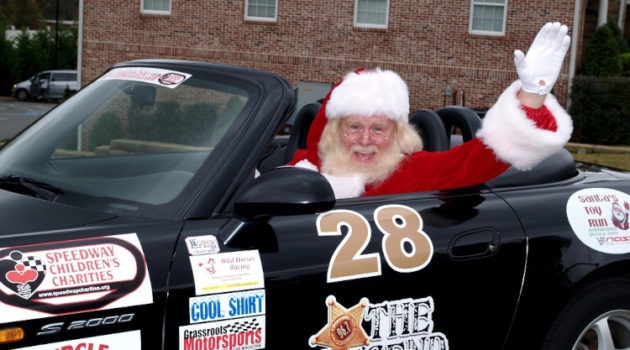 Santa in a convertible sports car