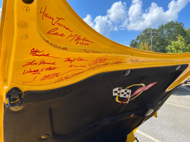 Signatures under a fifth-generation Corvette hood