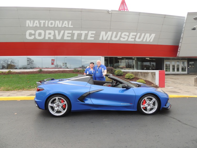A blue C8 Corvette outside the National Corvette Museum